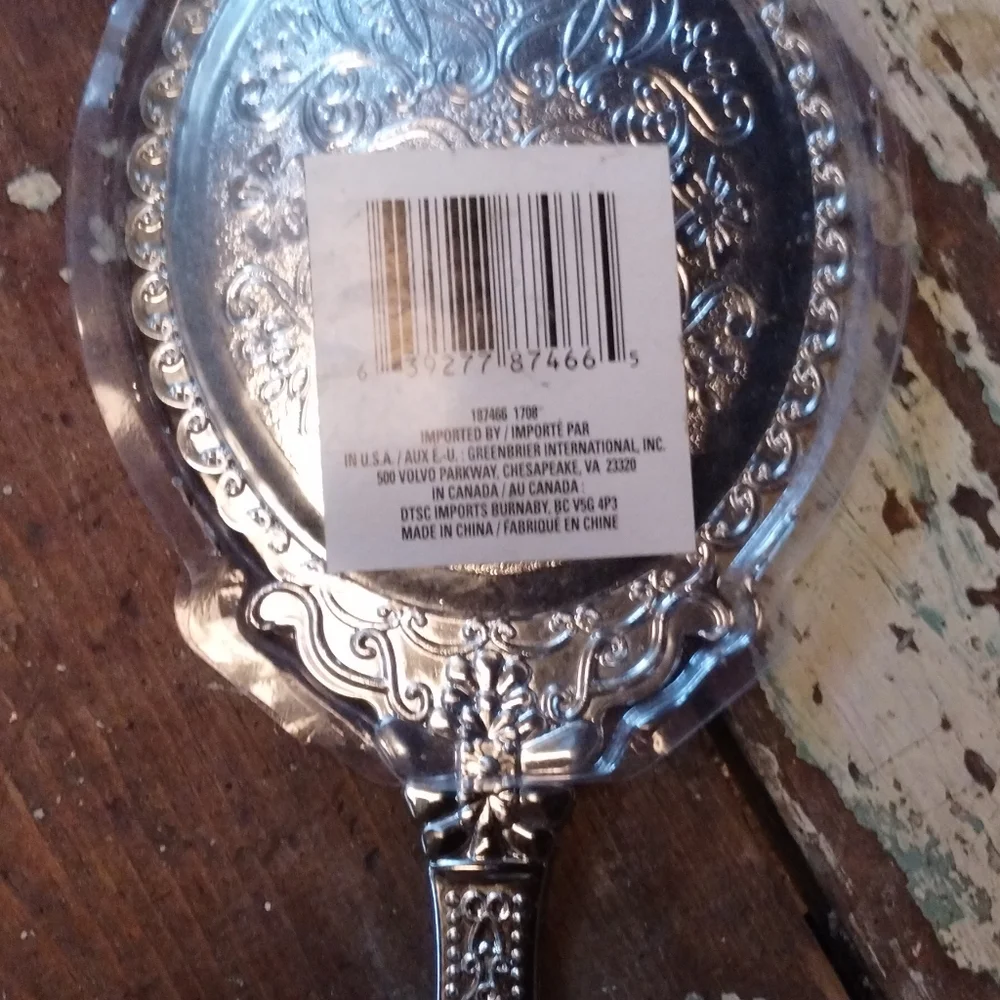plastic handheld silver colored mirror
